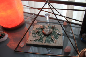 copper pyramid with crystal grid on sacred geometry tile - sacred space